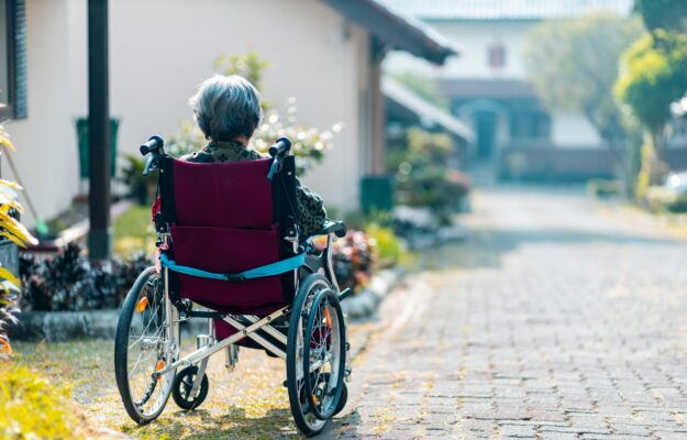 woman sitting on wheelchair